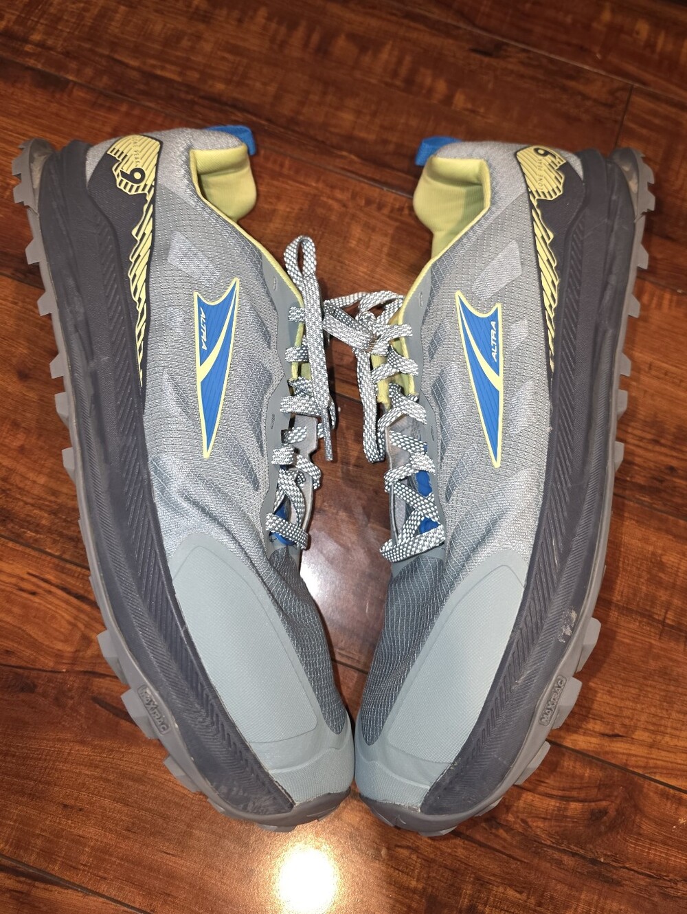Altra Lone Peak 9 Trail Sneakers in Gray with Blue and Yellow Accents